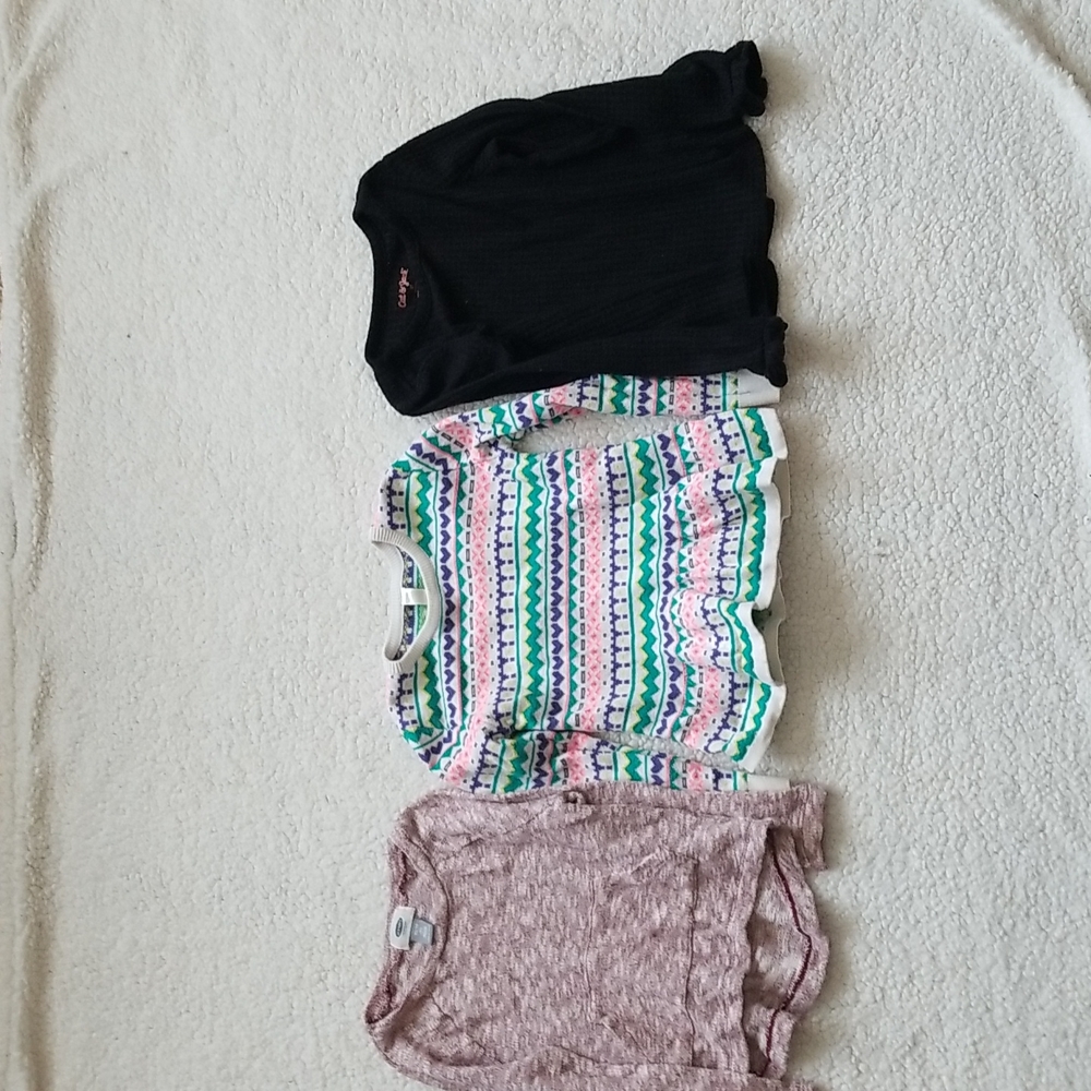 A set of 3 long light sweaters